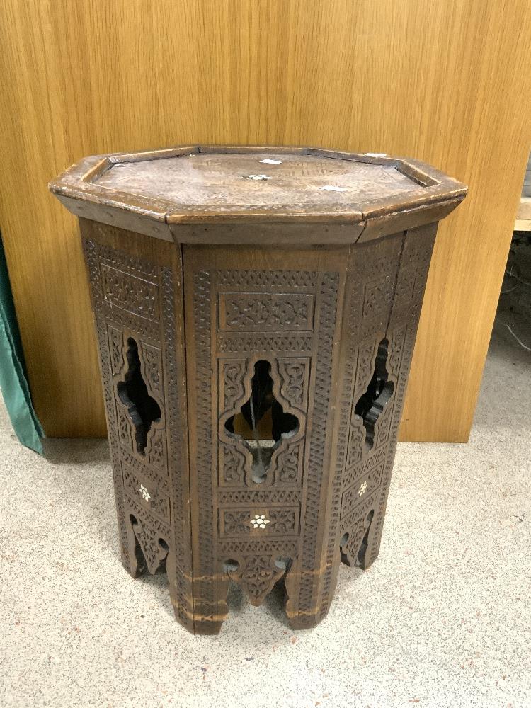 ANTIQUE CARVED AND MOTHER O PEARL INLAID OCTAGONAL MOORISH TABLE. 40X53. - Image 3 of 3