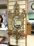 A NINETEENTH CENTURY ORNATE GILTWOOD AND GESSO GIRONDOLE WALL MIRROR, WITH CHERUB, PHEONIX, SWAG AND