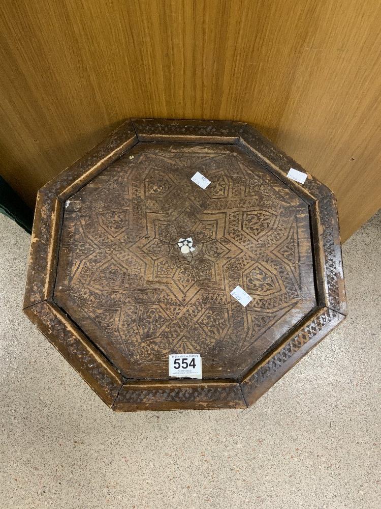 ANTIQUE CARVED AND MOTHER O PEARL INLAID OCTAGONAL MOORISH TABLE. 40X53. - Image 2 of 3