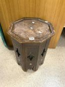 ANTIQUE CARVED AND MOTHER O PEARL INLAID OCTAGONAL MOORISH TABLE. 40X53.