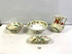 A SMALL PORCELAIN FLORAL DECORATED TOILET SET.