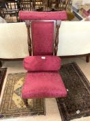 A VICTORIAN FAUX ROSEWOOD UPHOLSTERED PRIE DEUX CHAIR, AND CUSHION.