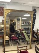 A LARGE NINETEENTH GILT GESSO MIRROR WITH MERCURY GLASS. 150X207 CMS.