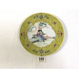 TWENTIETH CENTURY CHINESEY ELLOW BORDERED PLATE, WITH FIGURES DECORATION. 25.5 CMS.