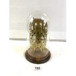 A HERMLE BRASS SKELETON CLOCK-GOTHIC CATHEDRAL DESIGN, UNDER GLASS DOME.