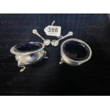 PAIR OF HALLMARKED SILVER SALTS WITH ORIGINAL BLUE LINERS ALSO A PAIR OF SPOONS MATCHING