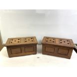 A PAIR OF MAHOGANY PANELLED COFFER SHAPED BOXES.