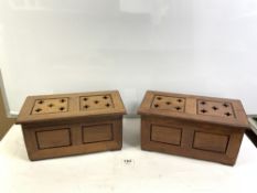 A PAIR OF MAHOGANY PANELLED COFFER SHAPED BOXES.