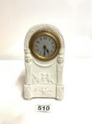 A FRENCH BREVET S.G.D.G. PARIAN WARE MANTEL CLOCK, WITH EMBOSSED GRIFFIN DECORATION, WITH A SILVERED