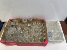 A QUANTITY OF CUT AND MOULDED GLASS WINE GLASSES, CHAMPAGNE FLUTES ETC.