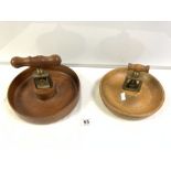 TWO VINTAGE WOODEN NUT BOWLS WITH COMBINATION SCREW NUT CRACKERS.