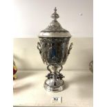 A SILVER PLATED BRITANNIA METAL TWO HANDLED SAMOVAR, WITH ENGRAVED DECORATION. 40CMS.