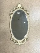 OVAL WHITE PAINTED ORNATE WALL MIRROR, 36X80.