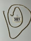 A YELLOW METAL CHAIN. 33 GRAMS.