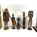 SIX TRIBAL CARVED WOODEN FIGURES - VARIOUS, 82 CMS TALLEST.
