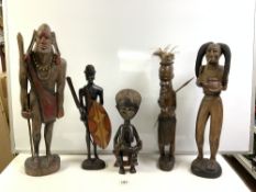 SIX TRIBAL CARVED WOODEN FIGURES - VARIOUS, 82 CMS TALLEST.