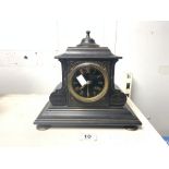 VICTORIAN BLACK SLATE MANTEL CLOCK WITH GILDING DECORATION, BLACK DIAL AND ROMAN NUMERALS AND ON
