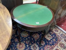 A DEMI LUNE MAHOGANY FOLDING TOP CARD TABLE ON BALL AND CLAW FEET, WITH GREEN BAIZE, 76 CMS OPEN.