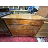 A REGENCY INLAID MAHOGANY CHEST OF FOUR GRADUATING DRAWERS, WITH BRASS SWAN NECK HANDLES ON SPLAY