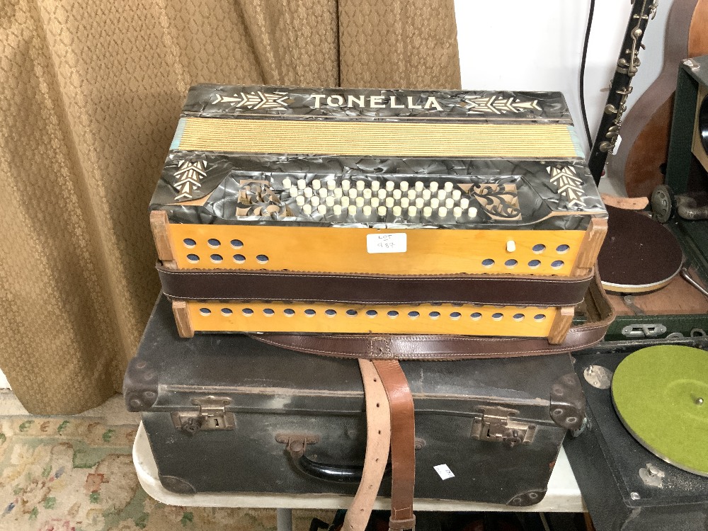 A 1950"S TONELLA PIANO ACCORDIAN IN CASE.