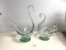 TWO GREEN GLASS SWAN SHAPED BOWLS. 30CMS TALLEST.