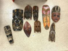 QUANTITY OF TRIBAL AFRICAN WALL MASKS; LARGEST 55CM