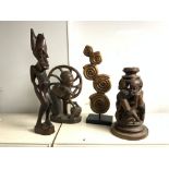 FOUR CARVED AFRICAN WOODEN TRIBAL FIGURES. 53CMS TALLEST.