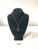 A VICTORIAN STONE SET 9ct GOLD PENDANT ON CHAIN, 3.2 GRAMS.