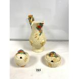 A 1950s CLARICE CLIFF FRUIT DECORATED HARVEST JUG; 28 CMS AND SUGAR AND JAM POTS.