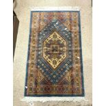 VINTAGE SILK AND WOOL RUG 118 X 70CM