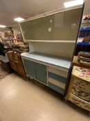 A 1950s BLUE AND WHITE AND FORMICA KITCHEN CABINET, WITH SLIDING DOORS AND FOUR DRAWERS,