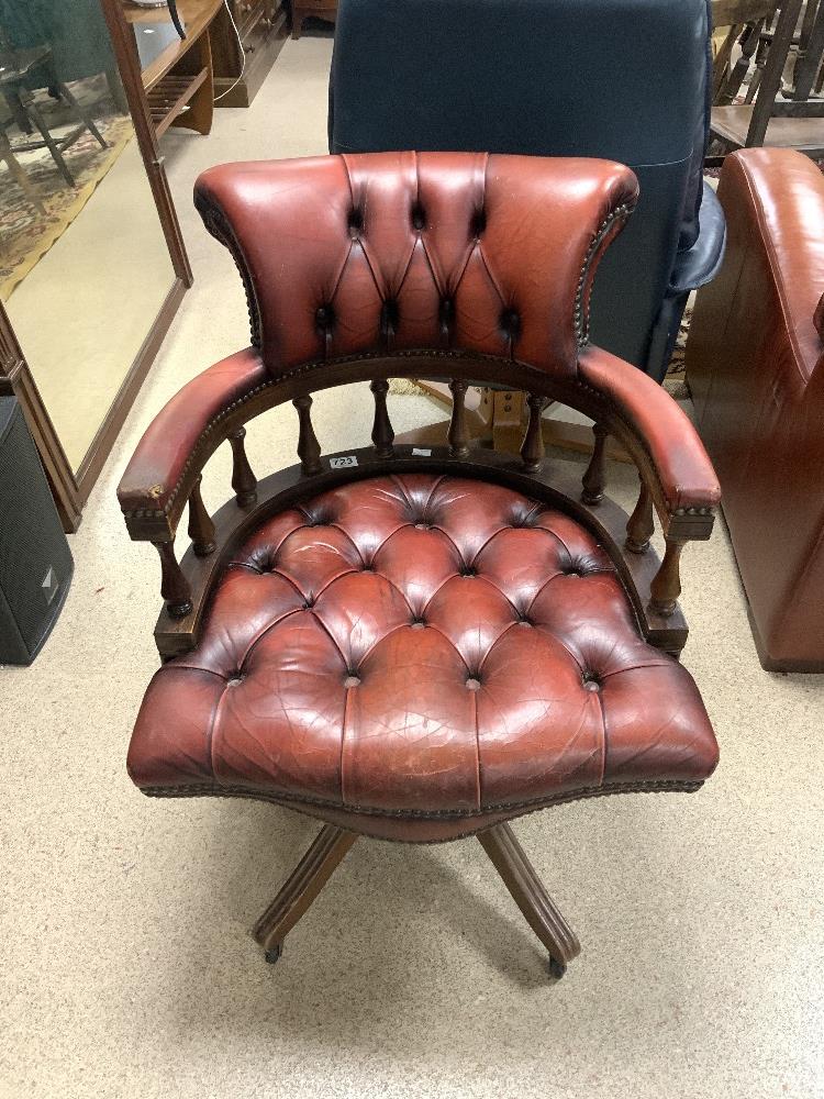 VINTAGE CAPTAINS CHAIR WITH SWIVEL ACTION AND ORIGINAL CASTORS OX BLOOD RED LEATHER