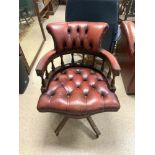 VINTAGE CAPTAINS CHAIR WITH SWIVEL ACTION AND ORIGINAL CASTORS OX BLOOD RED LEATHER