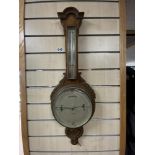 A LATE VICTORIAN CARVED OAK BANJO BAROMETER, BY J PERRY - NOTTINGHAM.