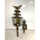 TWO ANTIQUE BRASS COACHING LAMPS, ONE WITH EAGLE MOUNT.