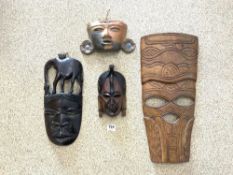 THREE AFRICAN TRIBAL WALL MASKS AND A SOUTH AMERICAN WALL MASK