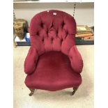 VICTORIAN BUTTON BACK ARMCHAIR IN DEEP RED CRUSHED VELVET ON ORIGINAL CASTORS