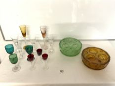 GREEN WINE GLASS WITH ETCHED GRAPE DECORATION, TWO CHAMPAGNE FLUTES, COLOURED GLASSES AND AMBER