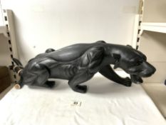 A LARGE CARVED EBONISED FIGURE OF A JAGUAR. 100 CMS APPROX.