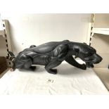 A LARGE CARVED EBONISED FIGURE OF A JAGUAR. 100 CMS APPROX.