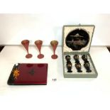 ORIENTAL LACQUERED COCKTAIL SET [CASED], THREE LACQUERED GOBLETS AND LACQUER PHOTO ALBUM.