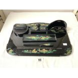 A BLACK LACQUERED DECORATED DESK SET.