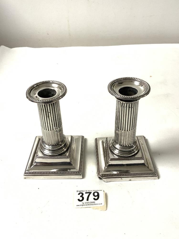 A PAIR OF HALLMARKED SILVER CORINTHIUM COLUMN CANDLESTICKS ON STEPPED SQUARE BASES, 12 CMS, - Image 2 of 6