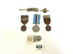 A BOSUNS WHISTLE, KINGS BADGE FOR LOYAL SERVICE, TWO HALLMARKED SILVER SAFE DRIVING MEDALS, A
