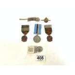 A BOSUNS WHISTLE, KINGS BADGE FOR LOYAL SERVICE, TWO HALLMARKED SILVER SAFE DRIVING MEDALS, A