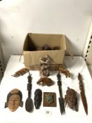 A QUANTITY OF CARVED WOODEN TRIBAL FIGURES AND ANIMALS ETC.