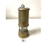 A BRASS " CYMRU " MINERS LAMP BY NED PRODUCTS LTD, 22CMS.