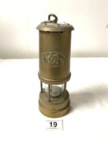 A BRASS " CYMRU " MINERS LAMP BY NED PRODUCTS LTD, 22CMS.