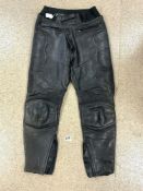 A PAIR OF MOTORCYCLE LEATHER TROUSERS BY FRANK THOMAS.