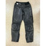 A PAIR OF MOTORCYCLE LEATHER TROUSERS BY FRANK THOMAS.